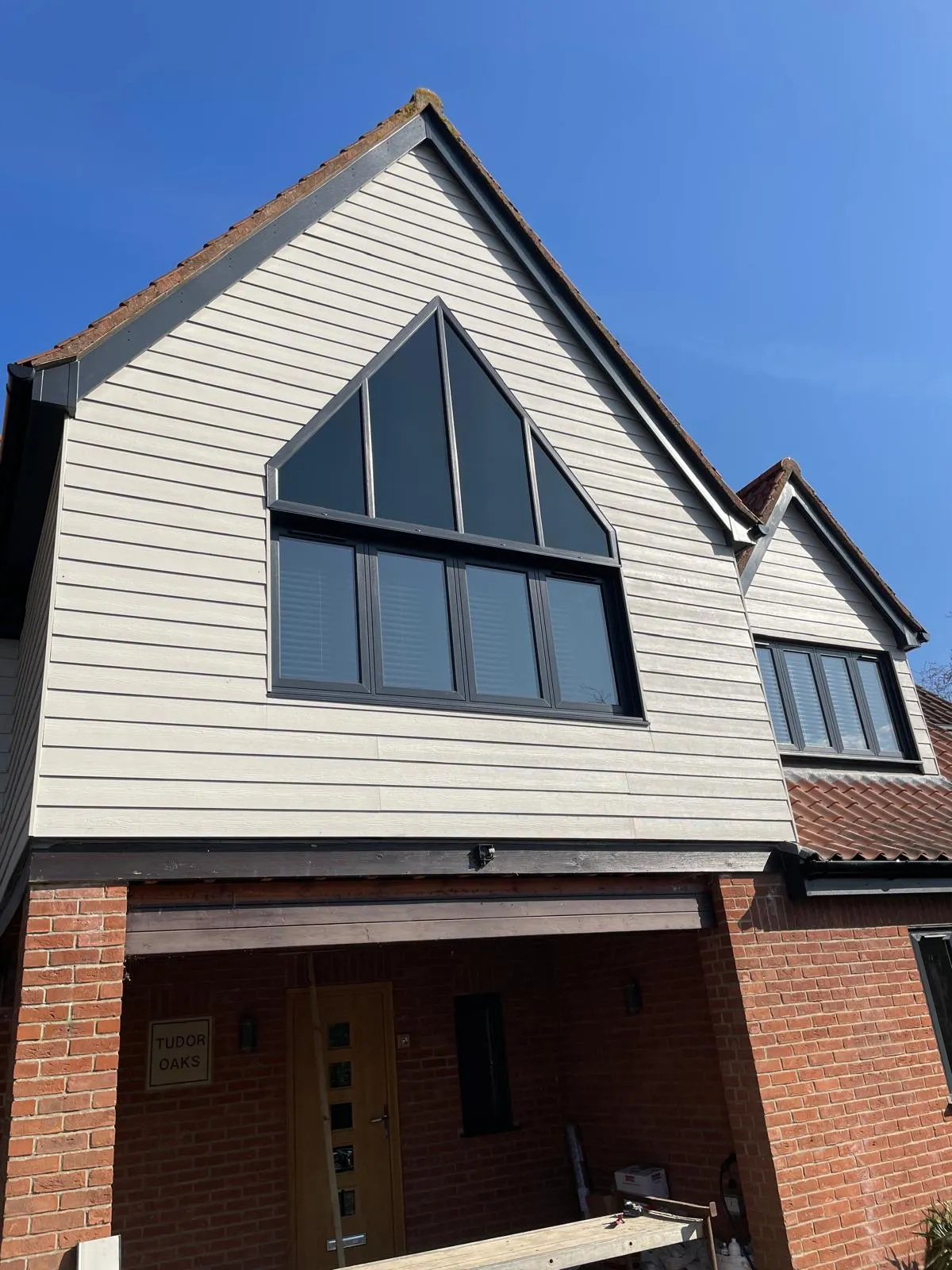 Modern fibre cement cladding installation on residential property in NR29 Norfolk"