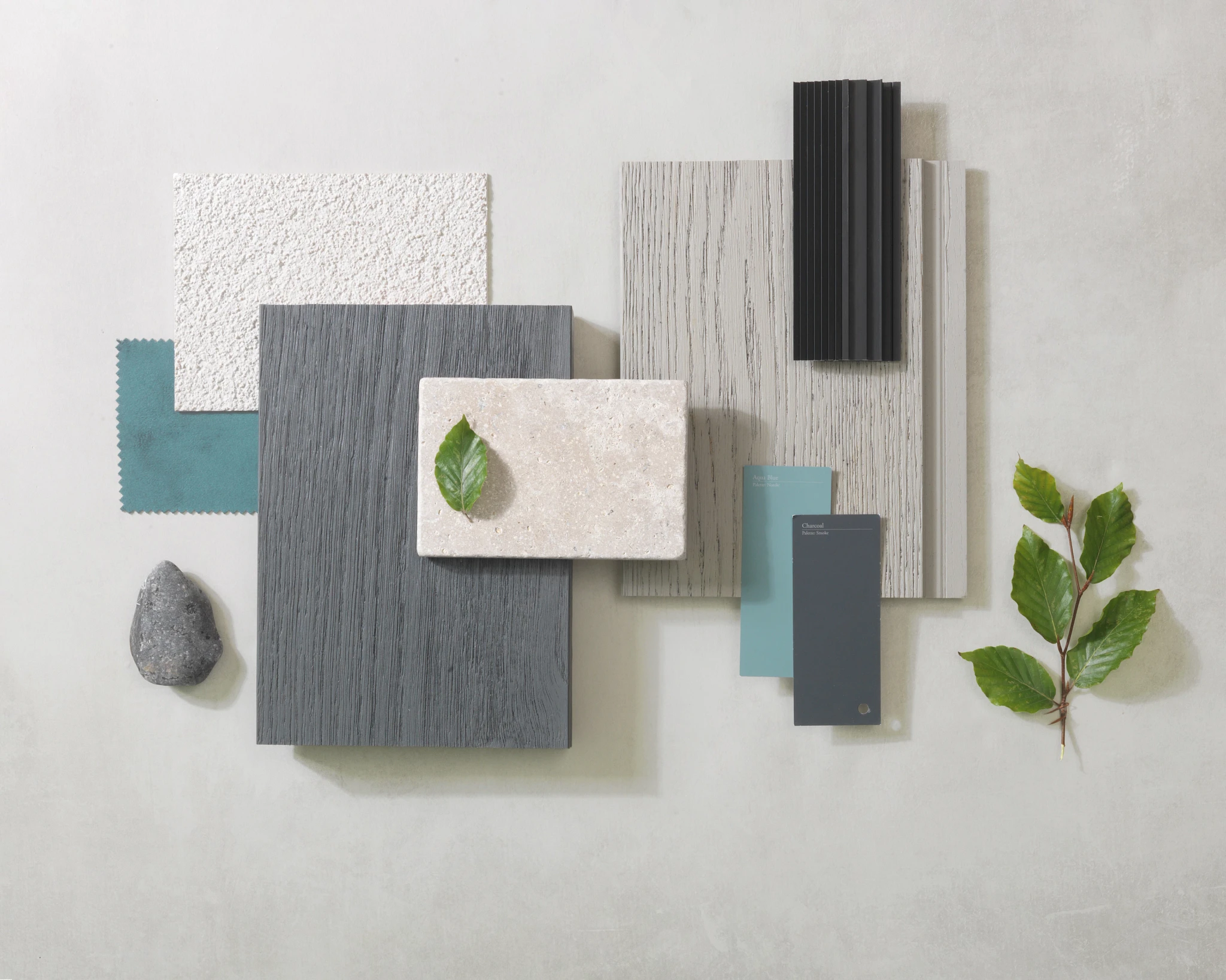 Composite cladding colour samples including brushed basalt and smoked oak finishes