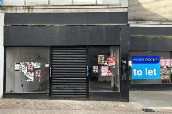 White lion storefront before