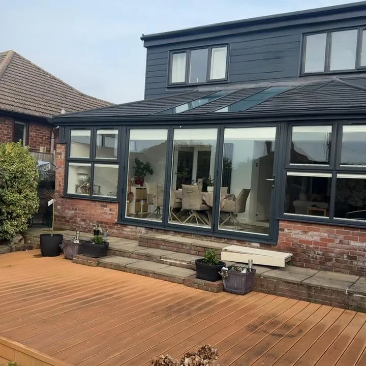 Finished solid roof conservatory conversion with decking, Caister-on-Sea NR30