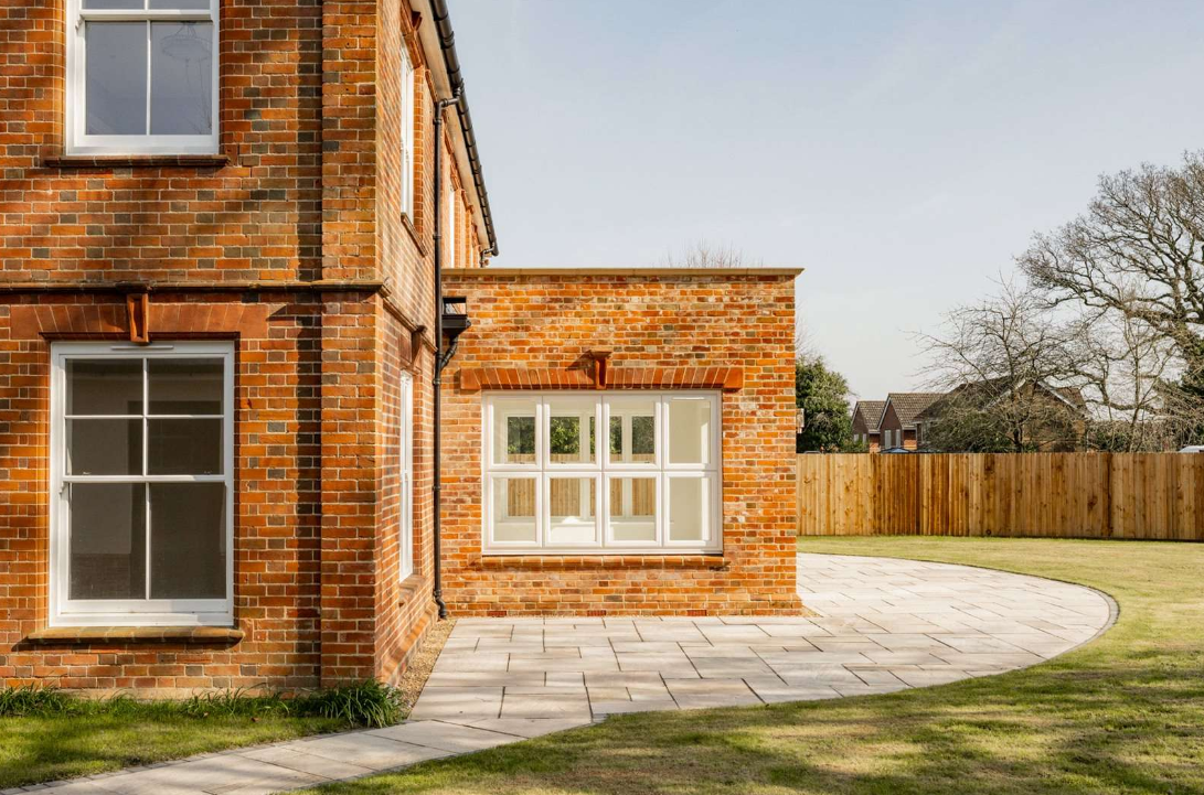 Striking Flat roof extension with uPVC flush windows installed on a victorian property in Poringland