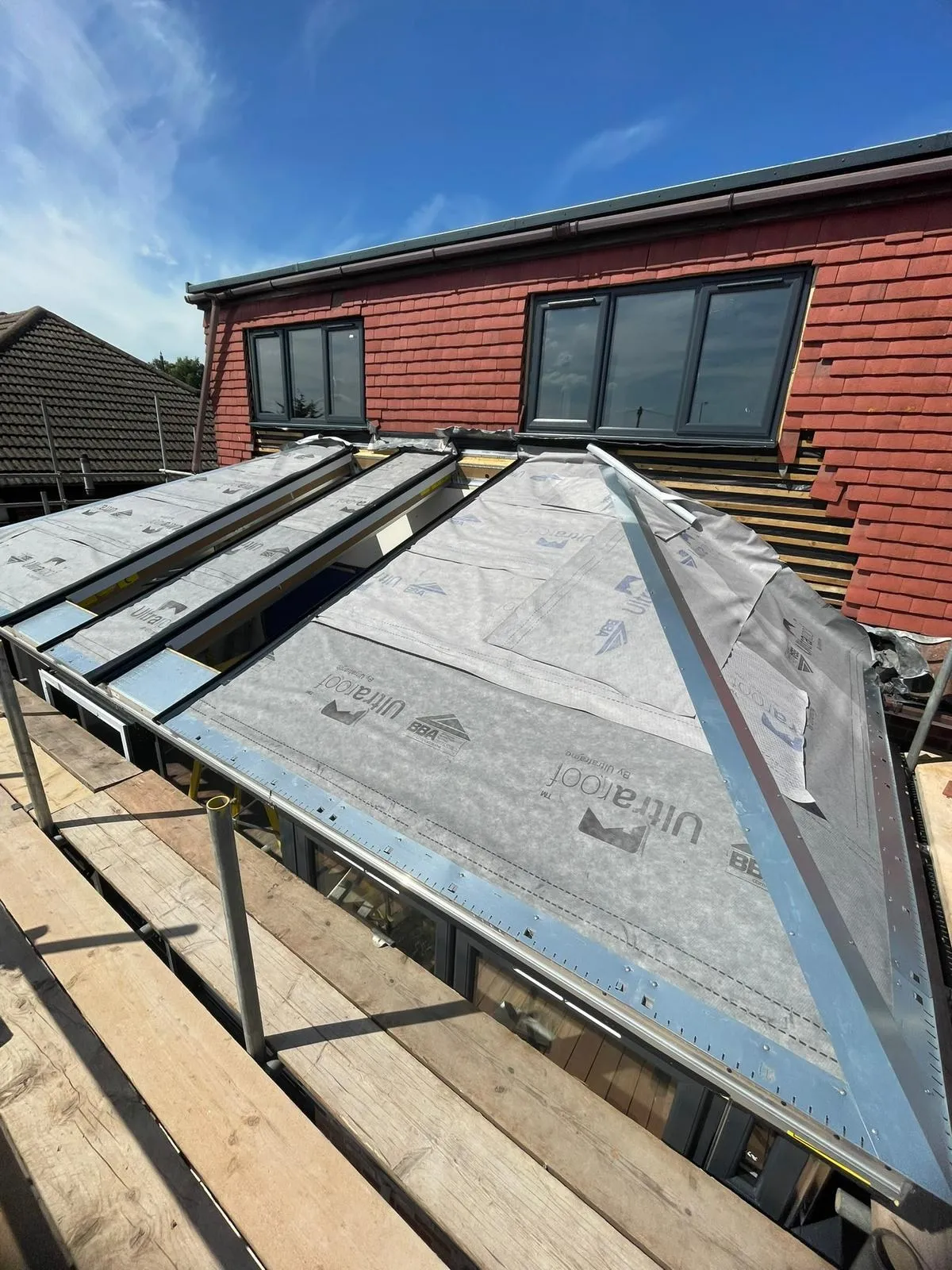 Breathable roof membrane laid over the deck before tiles are fitted