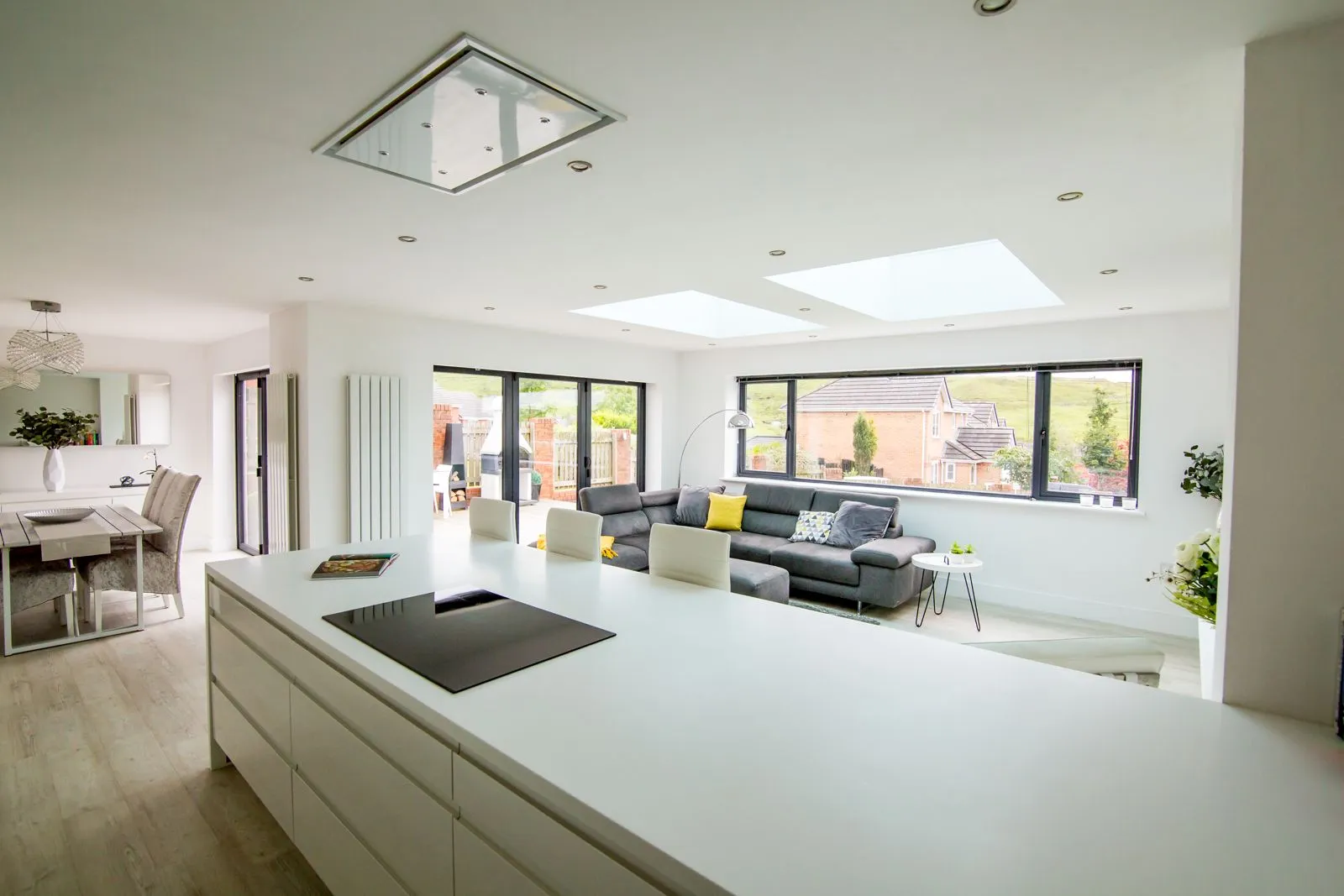 Open-plan kitchen and living extension with two flat rooflights in a flat roof
